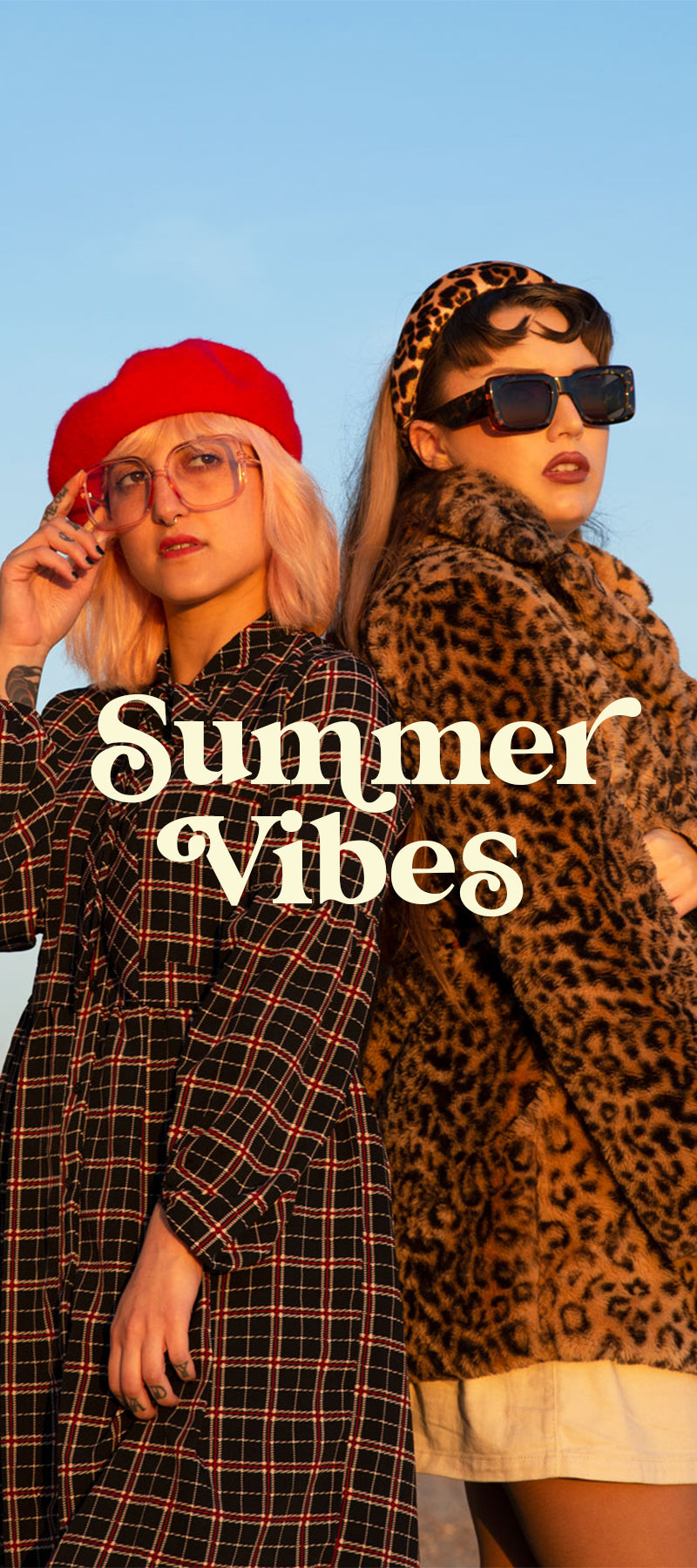 Odysee Summer Vibes - Female Models On Seafront Wearing Aprhodite oversized Retro Blue Light Glasses in Candyfloss and Ray Retro Sunglasses